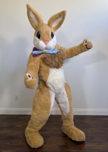 easter bunny mascot waving and greeting guests at a holiday celebration in southern california