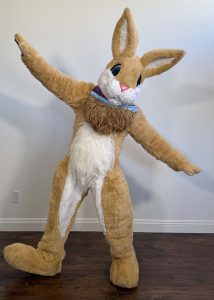 easter bunny mascot waving and greeting guests at a holiday celebration in southern california